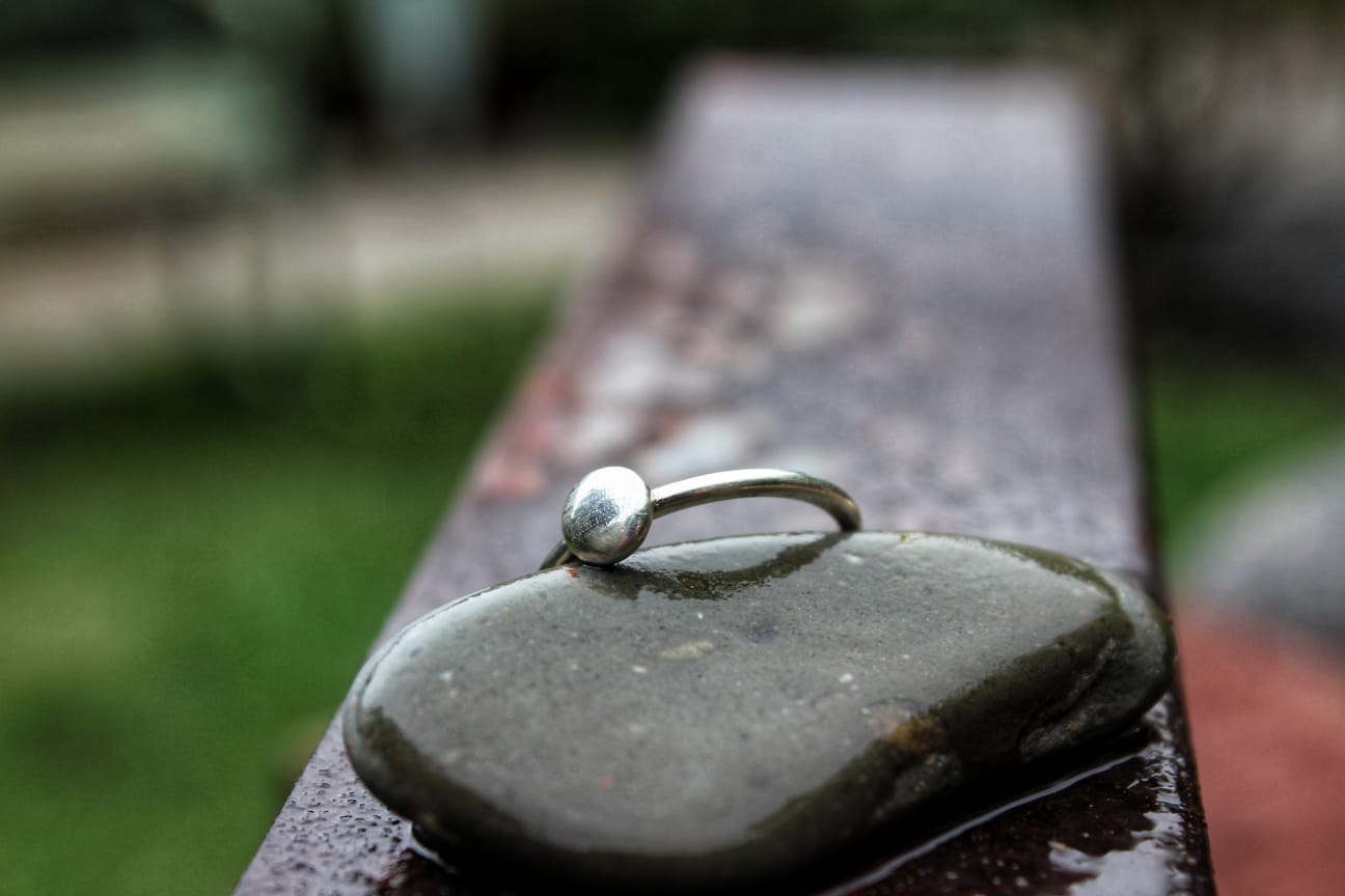 The Soft Seed memorial ring side view — pregnancy loss keepsake | NOVA EMBRACE