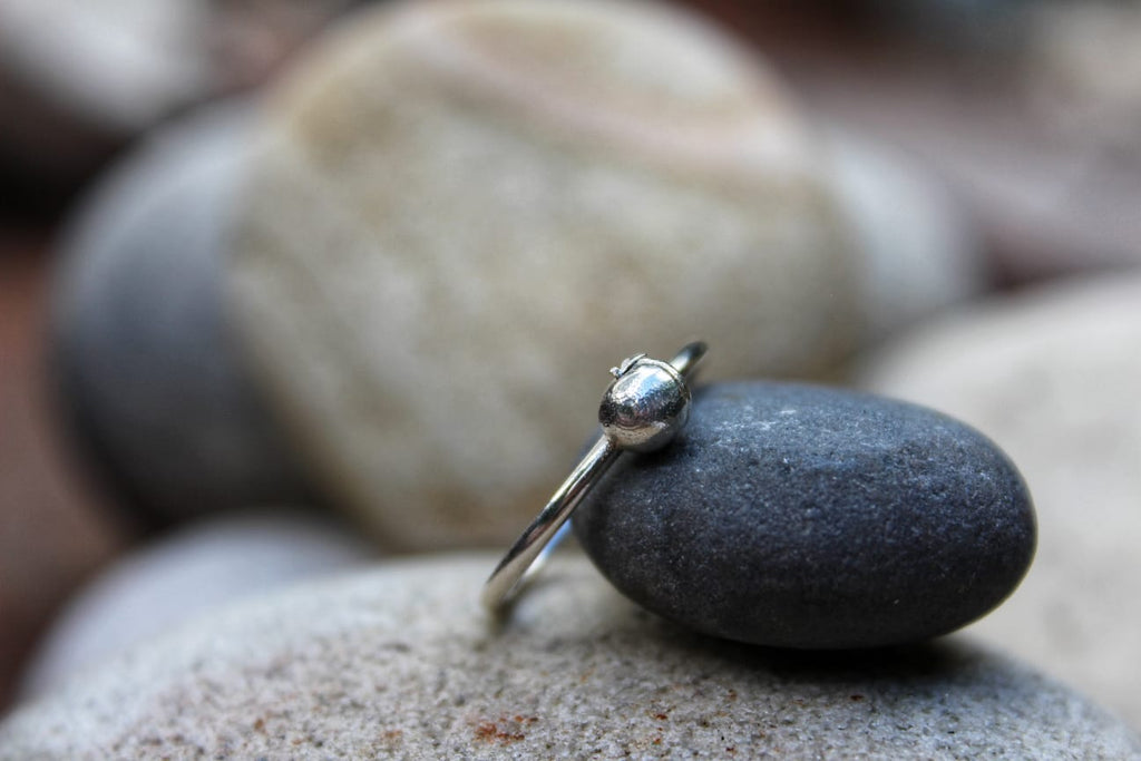 The Apricot Dawn ring side angle — pregnancy loss memorial keepsake | NOVA EMBRACE